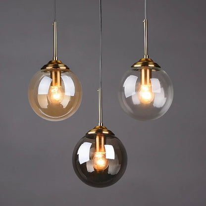 Orbelle Art-déco-Pendelleuchte aus Messing mit Glaskugel